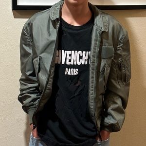 Green bomber jacket with pockets